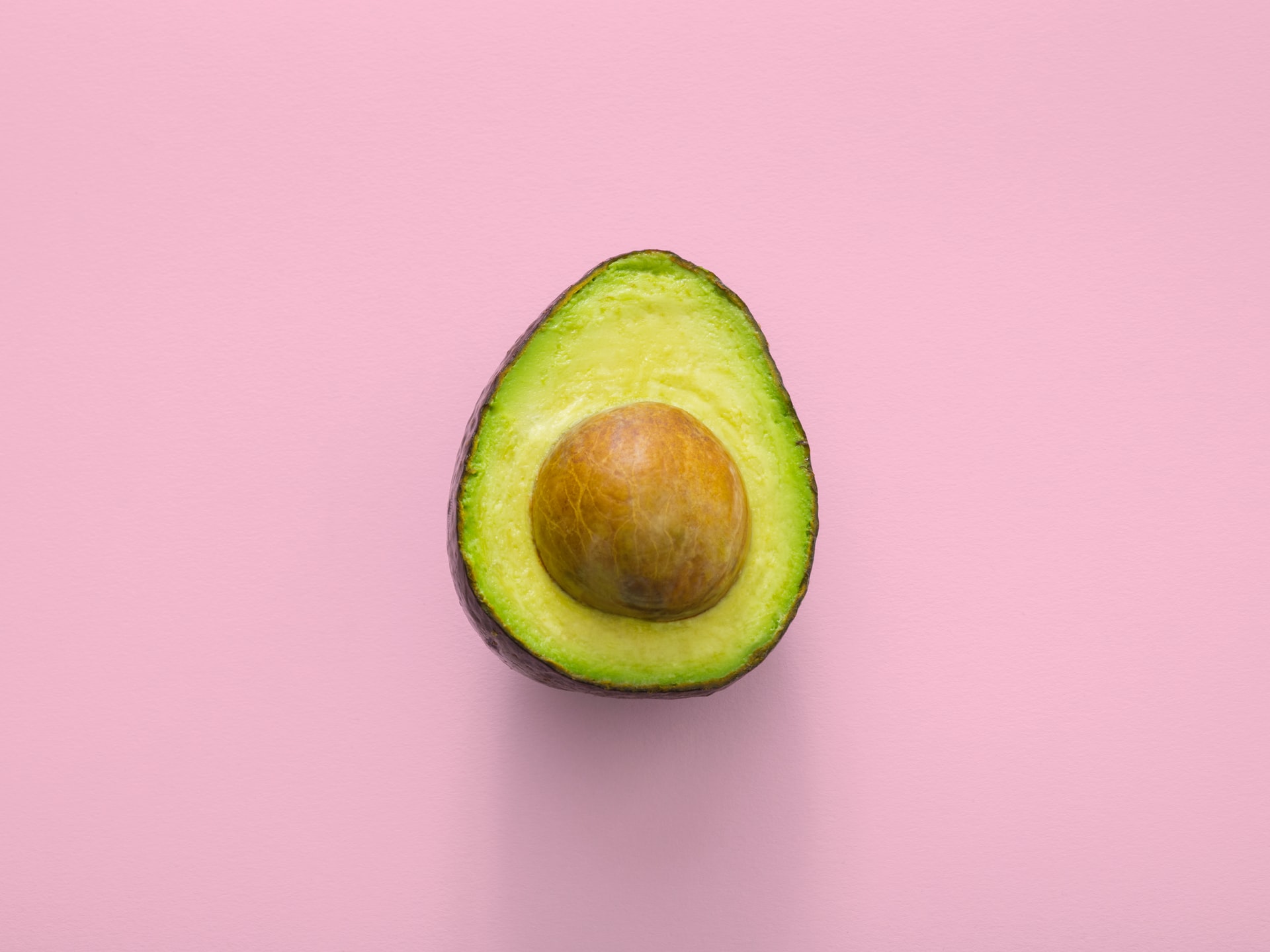The avocado show bar design cover image. An open avocado.